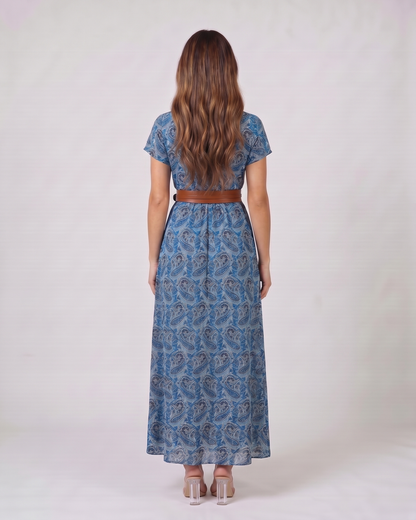 Back view of blue paisley v neck short sleeve maxi dress showing solid back