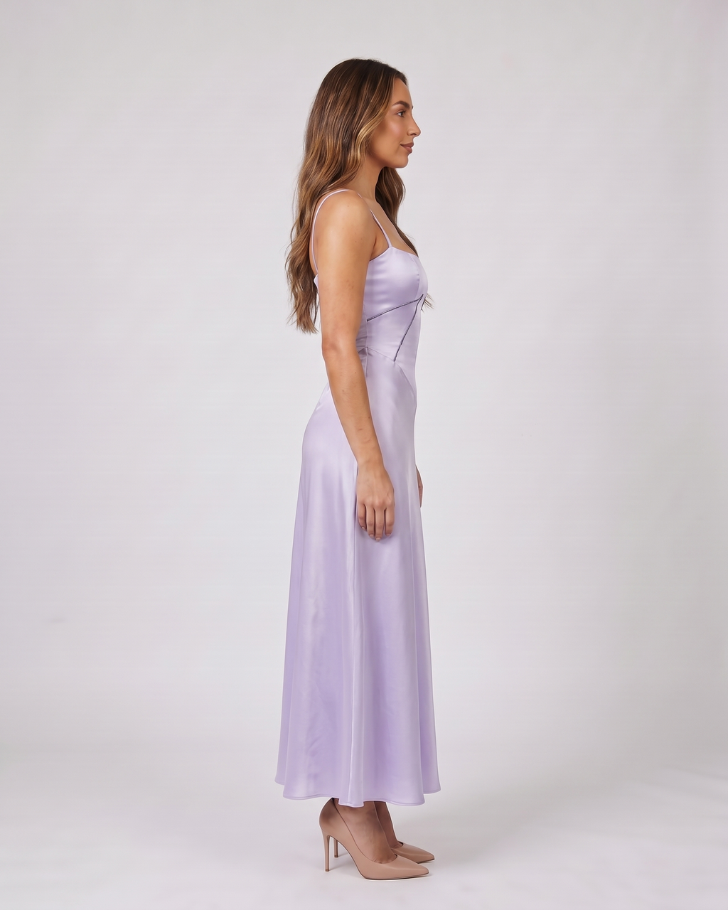 Side view of purple satin square neck seamed maxi dress