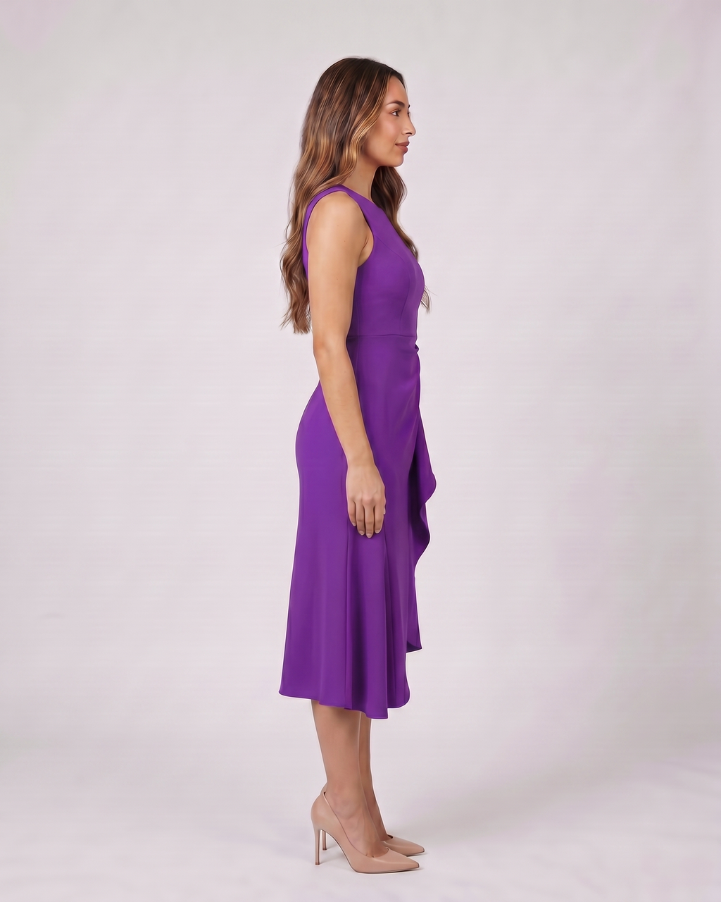 Side view of purple sleeveless asymmetric draped midi dress