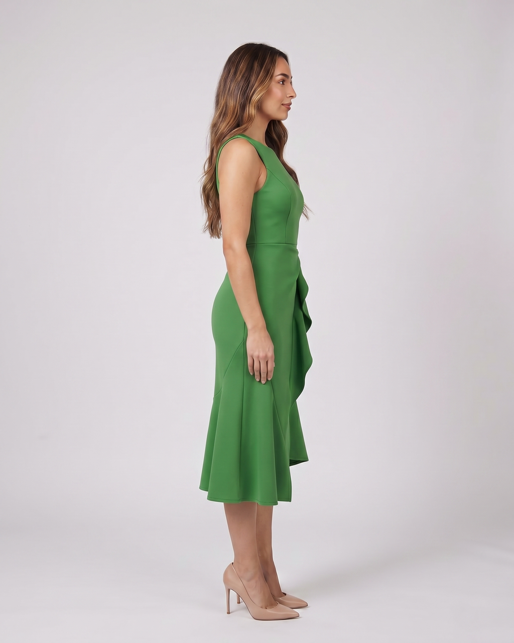 Side view of green sleeveless asymmetric draped midi dress
