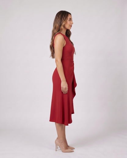 Side view of red sleeveless asymmetric draped midi dress