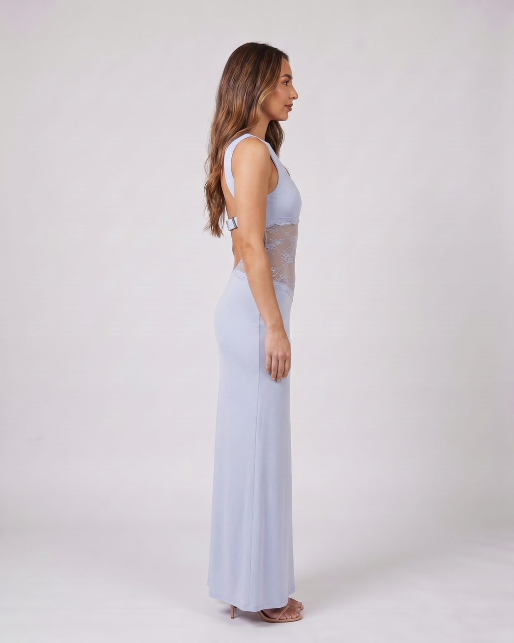 Side view of blue sleeveless open back lace maxi dress