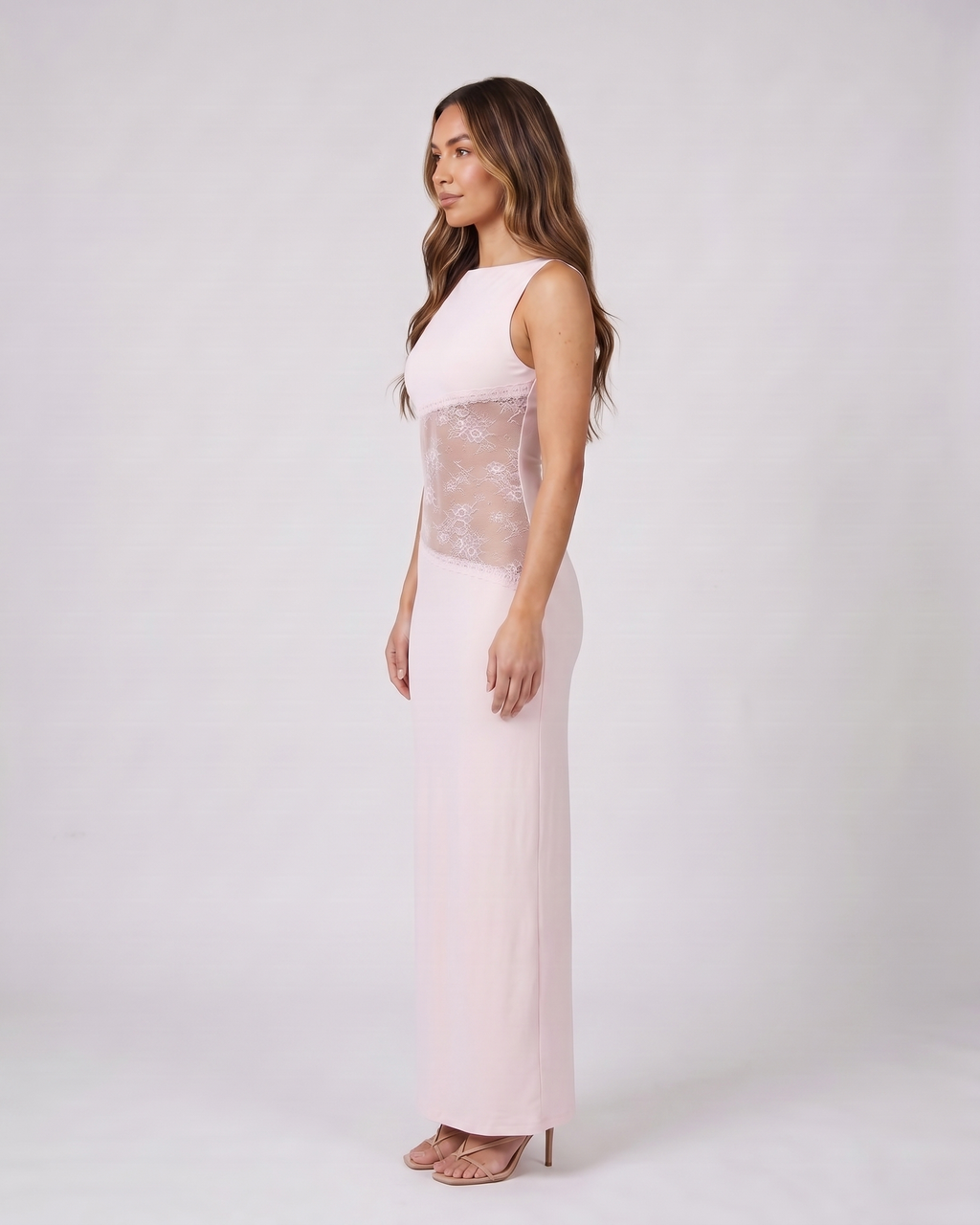 Side view of pink sleeveless open back lace maxi dress
