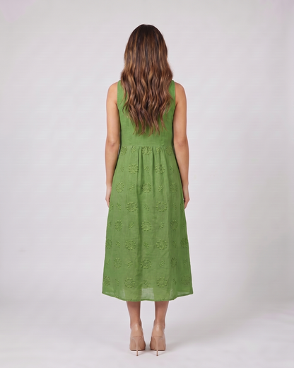 Back view of green sleeveless round neck embroidered midi dress showing solid back