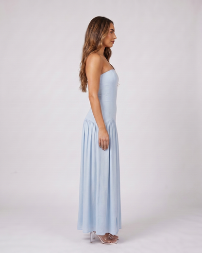 Side view of blue strapless bandeau with front split maxi dress