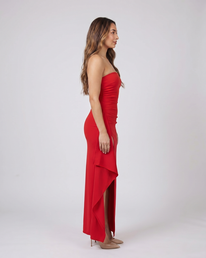 Side view of red strapless ruched thigh split maxi dress