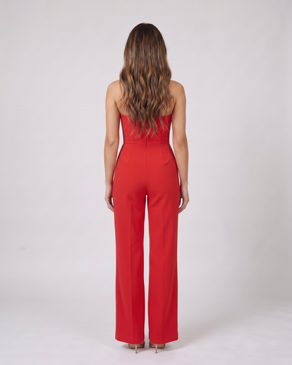 Back view of red strapless sweetheart wide leg formal jumpsuit showing not visible