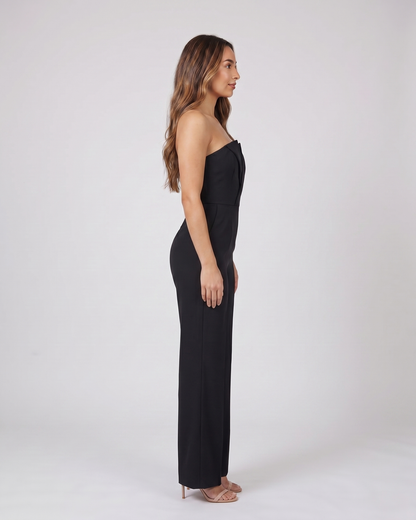 Side view of black strapless sweetheart wide leg formal jumpsuit