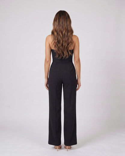 Back view of black strapless sweetheart wide leg formal jumpsuit showing not visible