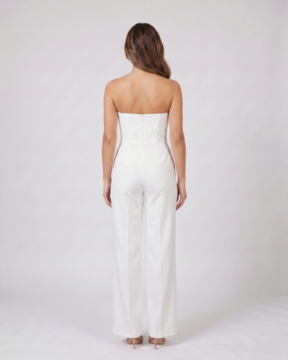 Back view of white strapless sweetheart wide leg formal jumpsuit showing not visible
