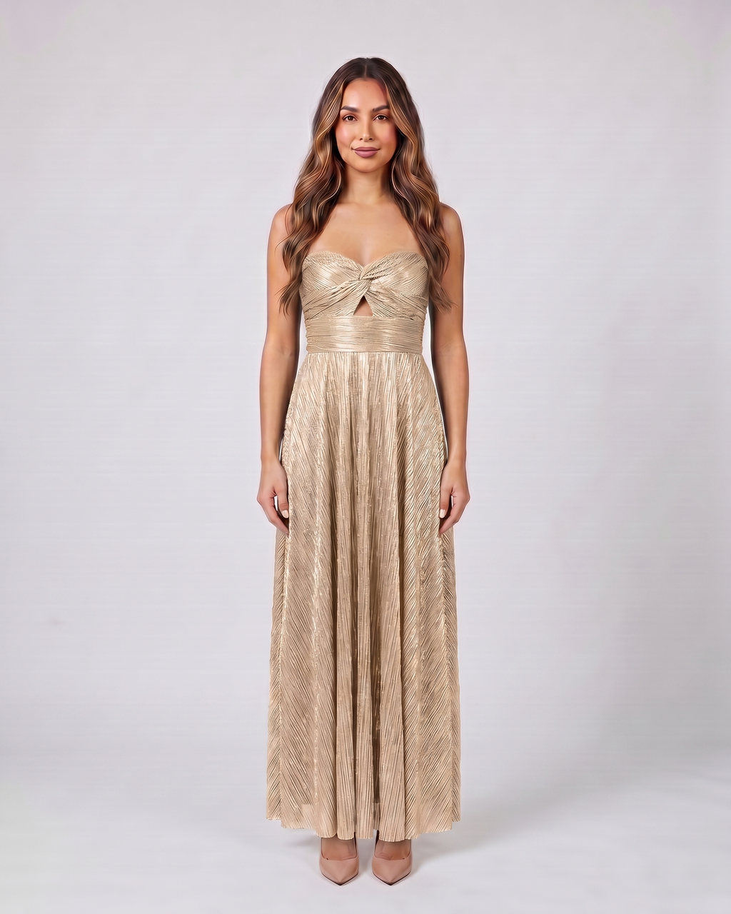 champagne strapless twist front keyhole maxi dress front view with vertical pleats