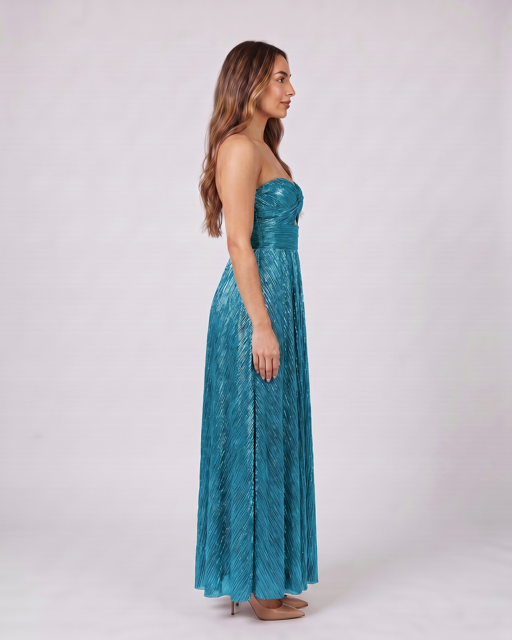 Side view of cyan strapless twist front keyhole maxi dress