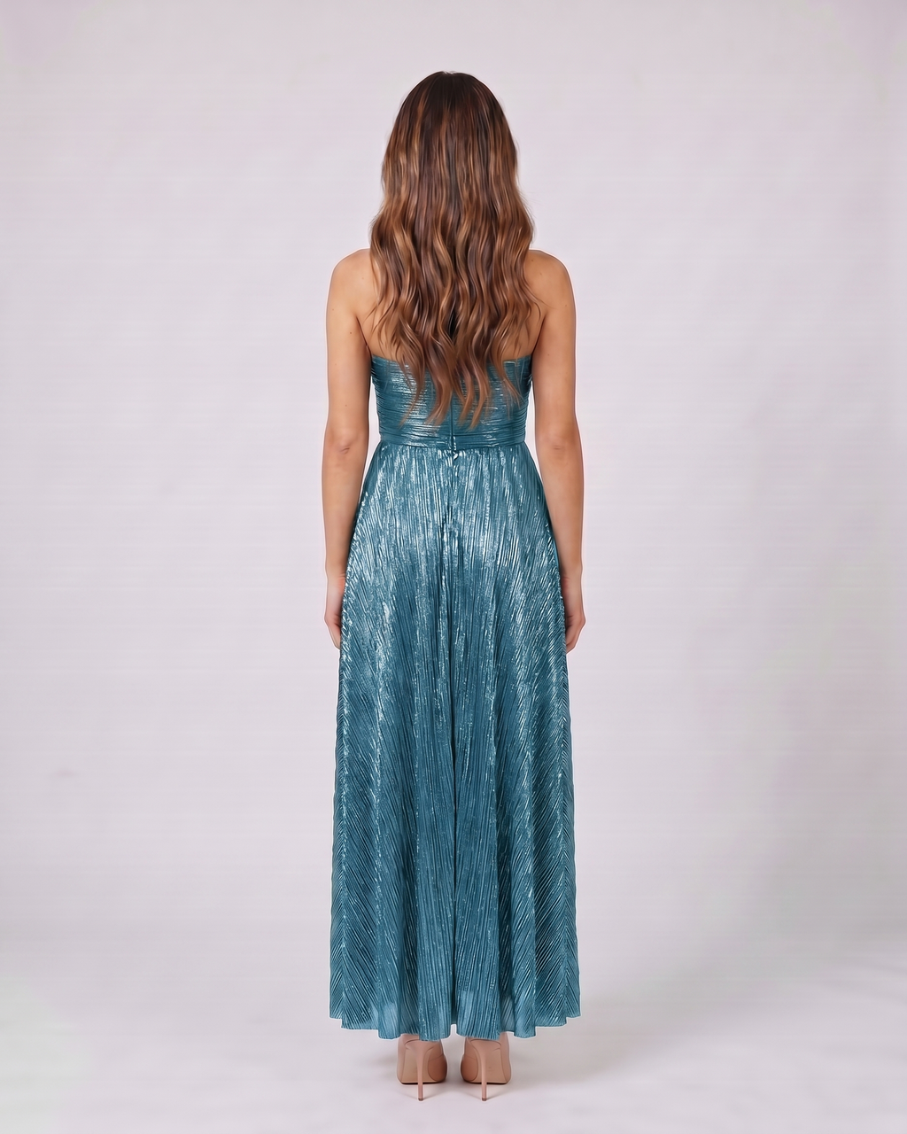 Back view of cyan strapless twist front keyhole maxi dress showing solid back