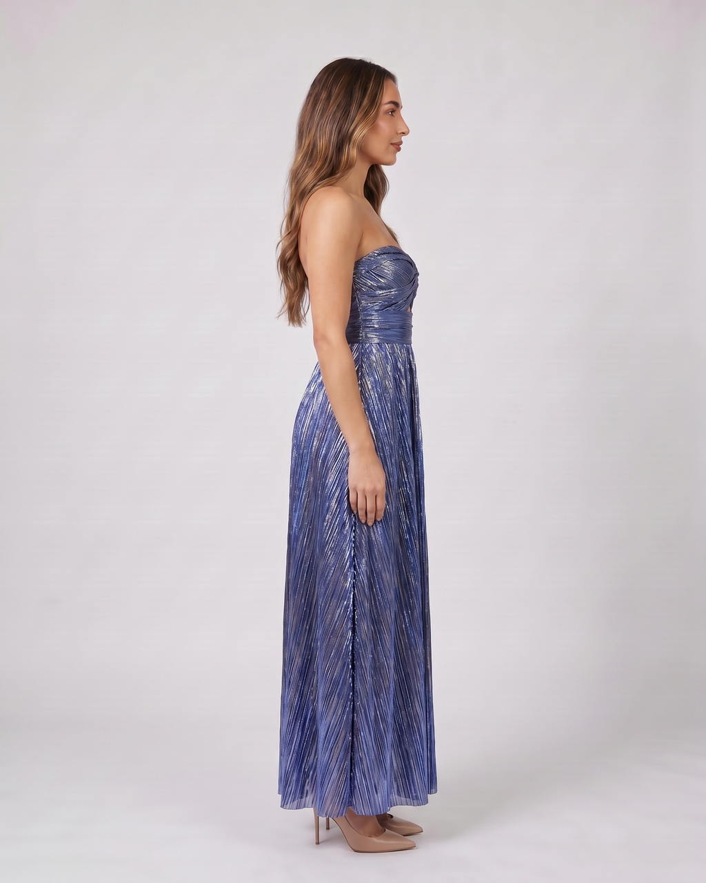 Side view of blue strapless twist front keyhole maxi dress