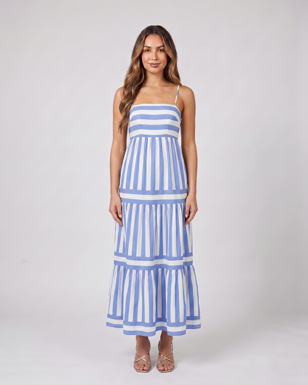 blue striped spaghetti strap maxi dress front view with vertical stripes and horizontal stripes