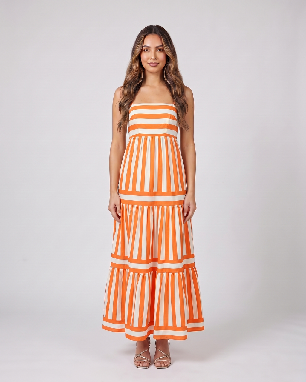 orange striped spaghetti strap maxi dress front view with vertical stripes and horizontal stripes