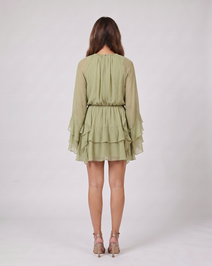 Back view of olive summer long sleeve ruffle mini dress showing solid back
