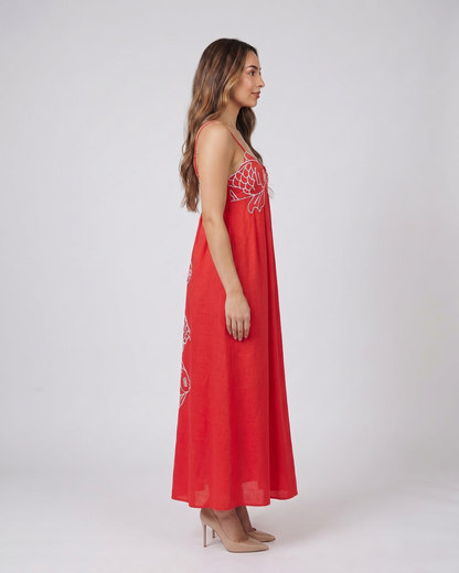 Side view of red sweetheart fish print maxi dress