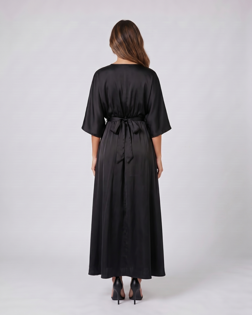 Back view of black v neck batwing sleeve maxi dress showing solid back