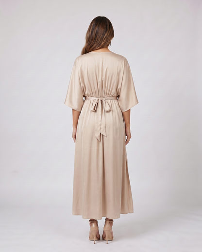 Back view of champagne v neck batwing sleeve maxi dress showing solid back