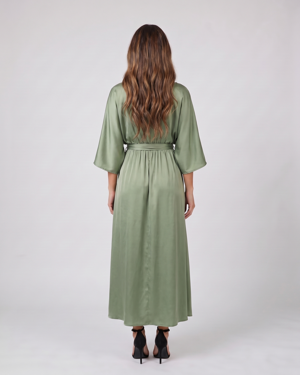 Back view of green v neck batwing sleeve maxi dress showing solid back