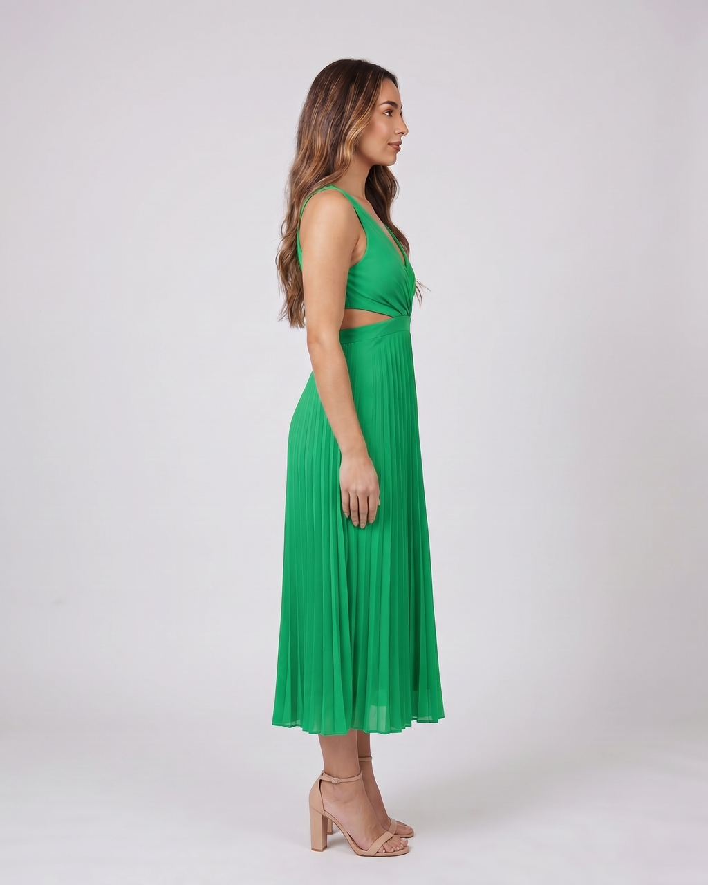 Side view of green v neck cutout pleated midi dress