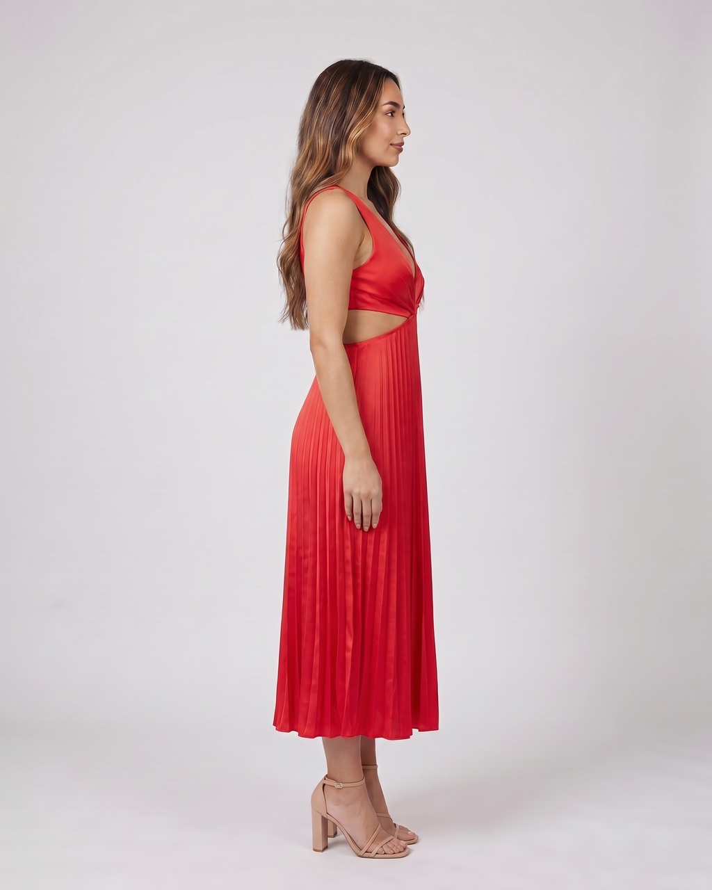 Side view of red v neck cutout pleated midi dress