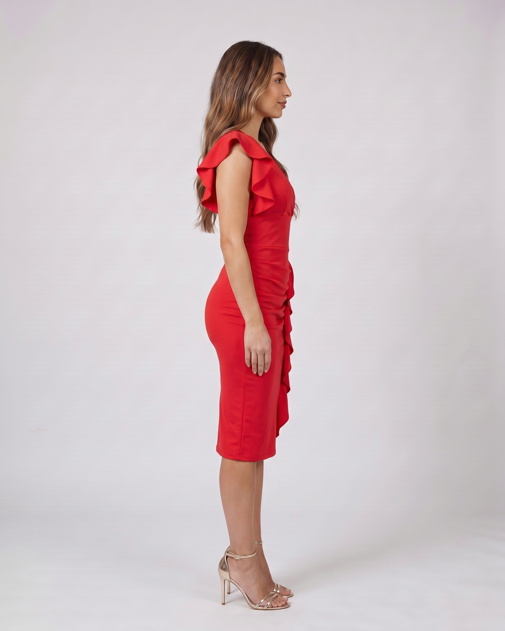 Side view of red v neck flutter sleeve ruched midi dress