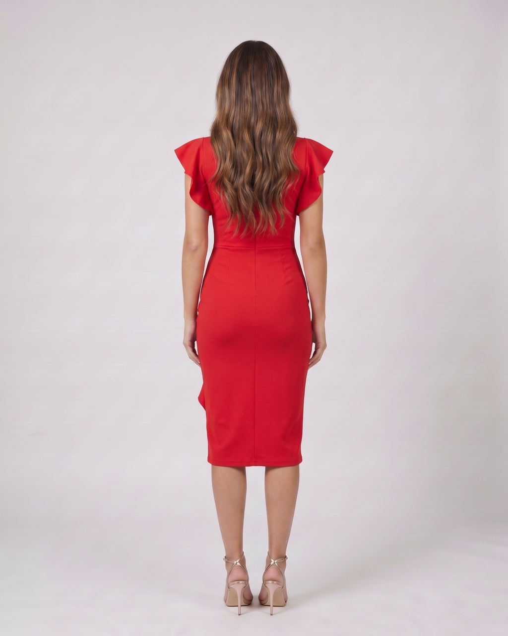 Back view of red v neck flutter sleeve ruched midi dress showing solid back