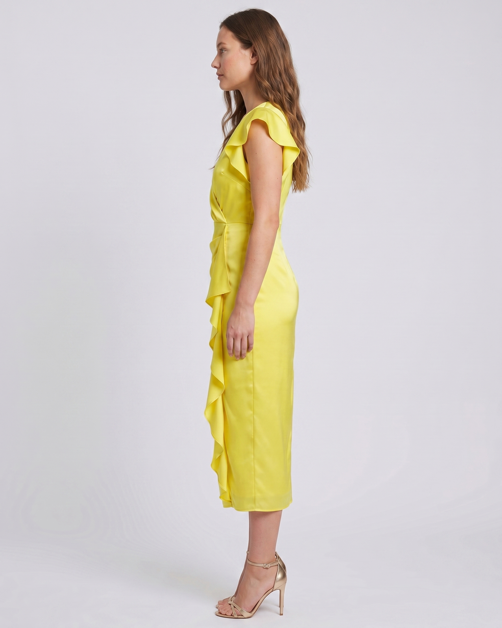 Side view of yellow v neck flutter sleeve ruched midi dress