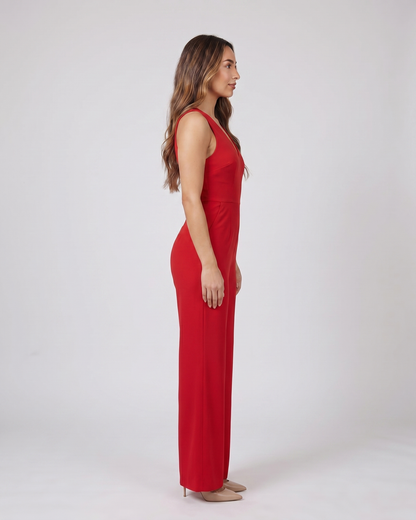 Side view of red v neck flutter sleeve wide leg jumpsuit