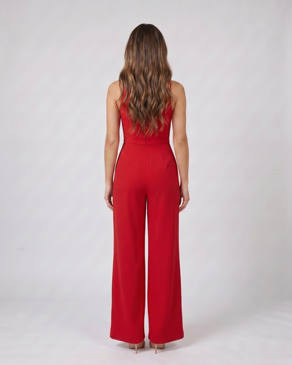 Back view of red v neck flutter sleeve wide leg jumpsuit showing solid back