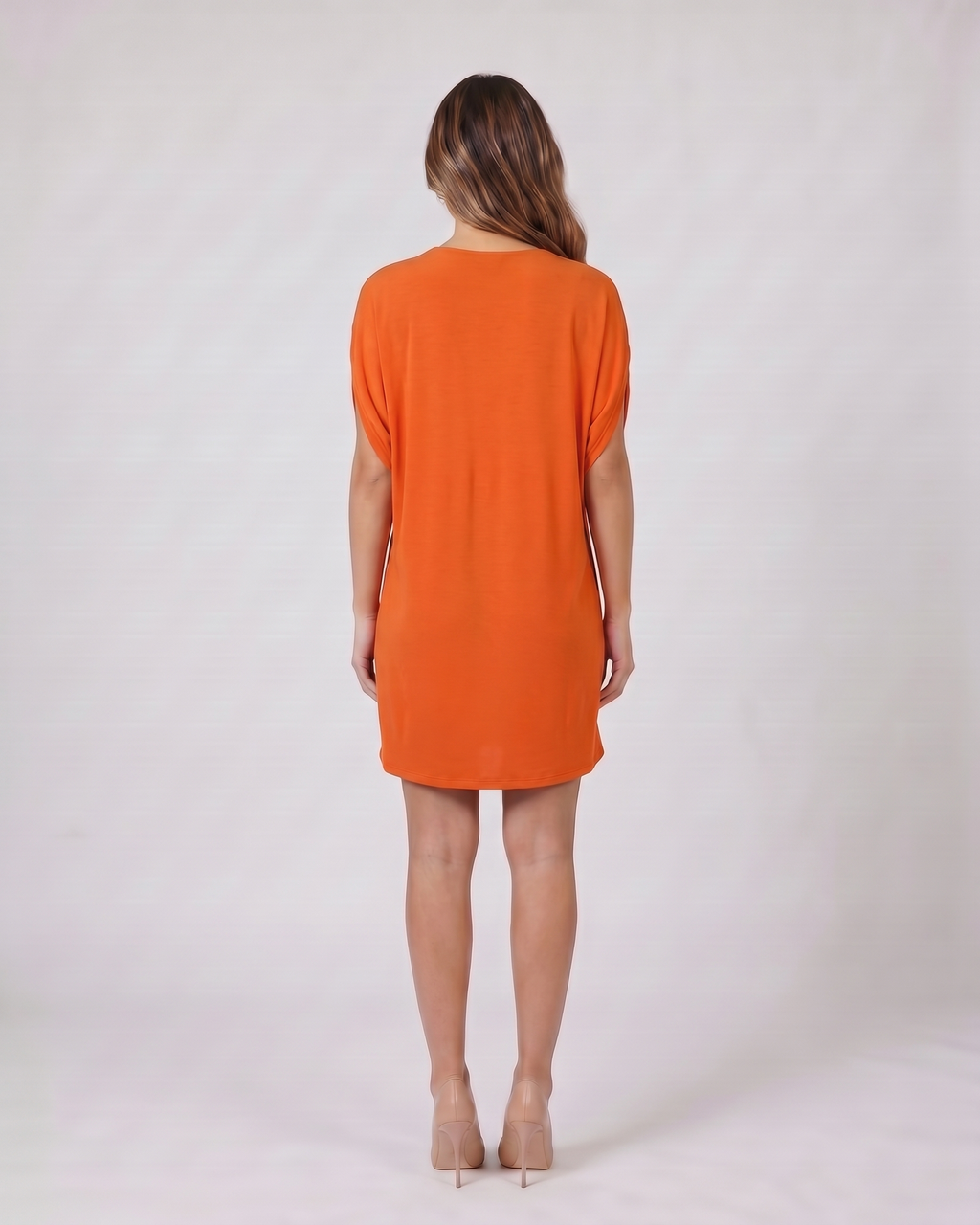 Back view of orange v neck split sleeve mini dress showing solid back