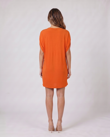 Back view of orange v neck split sleeve mini dress showing solid back