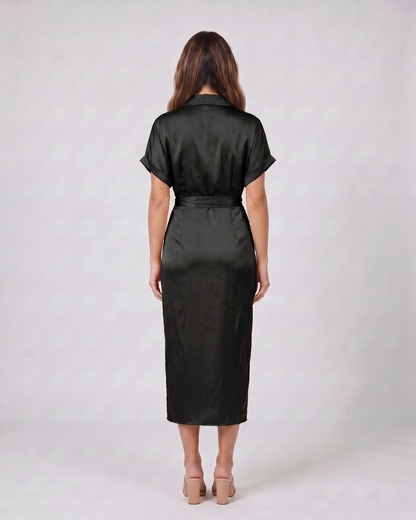 Back view of black wedding guest collared v neck midi dress showing solid back