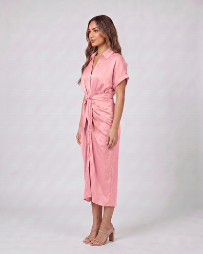 Side view of pink wedding guest collared v neck midi dress