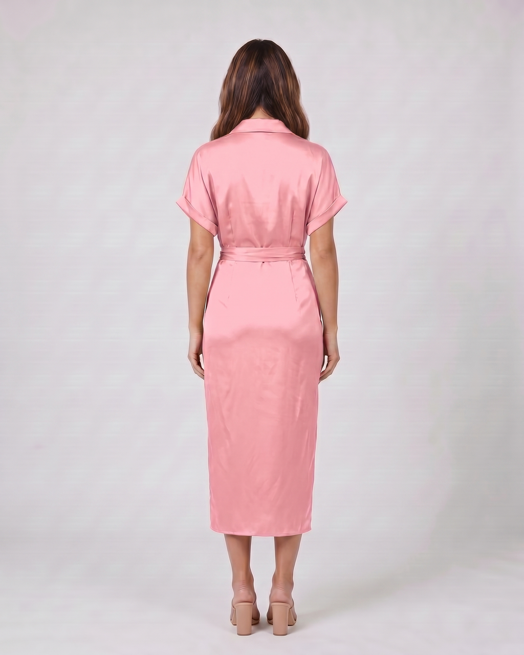 Back view of pink wedding guest collared v neck midi dress showing solid back