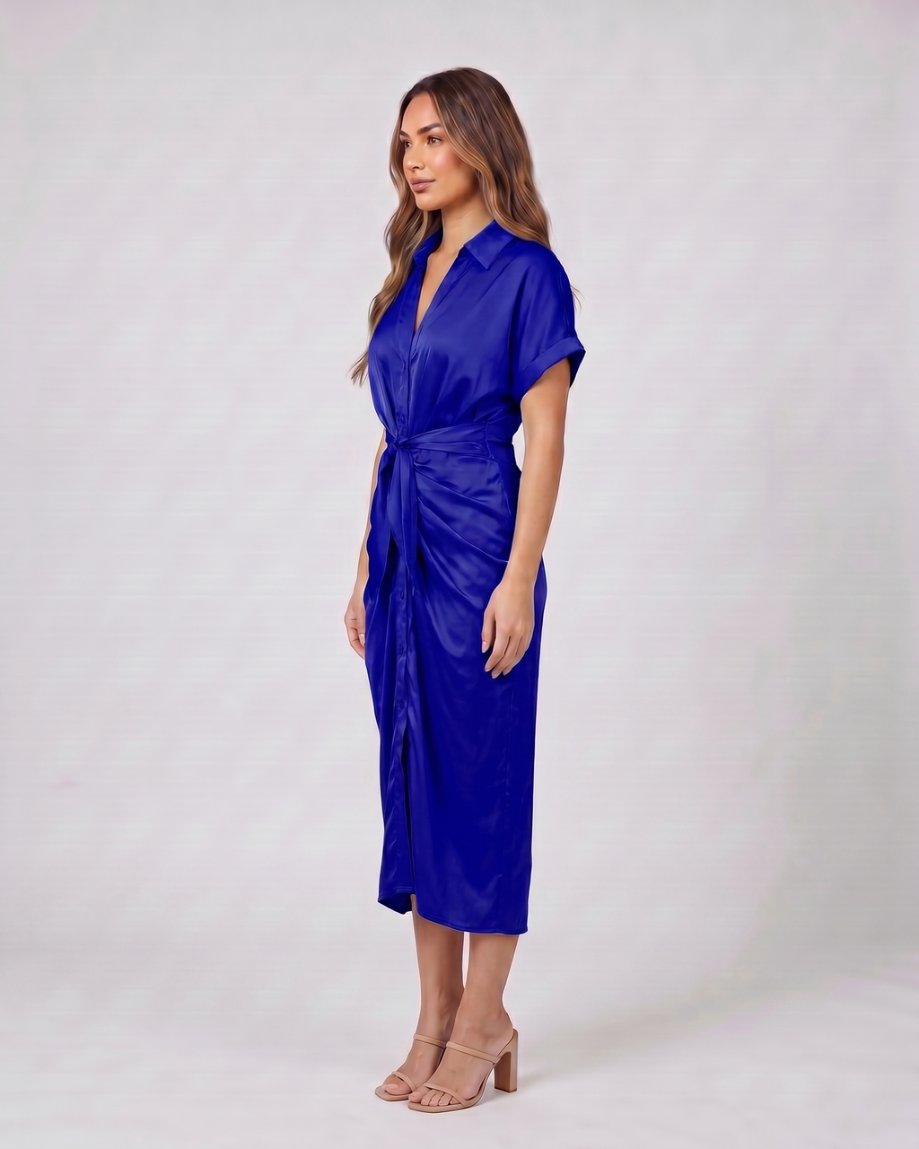 Side view of dark blue wedding guest collared v neck midi dress