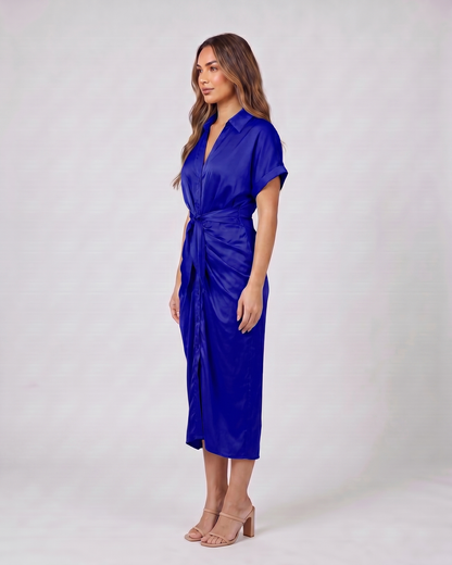 Side view of dark blue wedding guest collared v neck midi dress