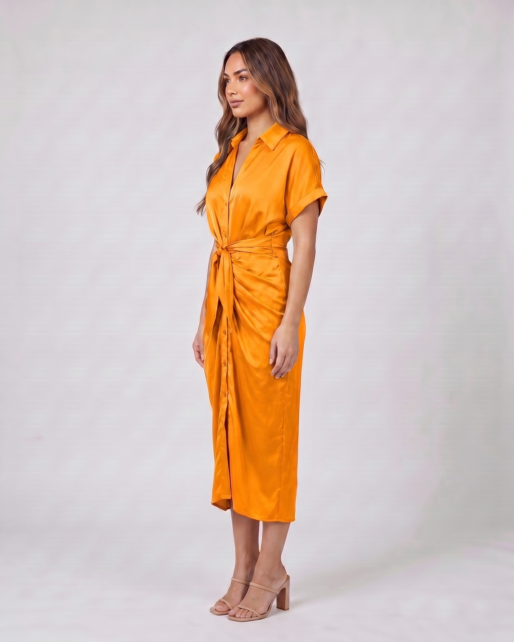 Side view of orange wedding guest collared v neck midi dress