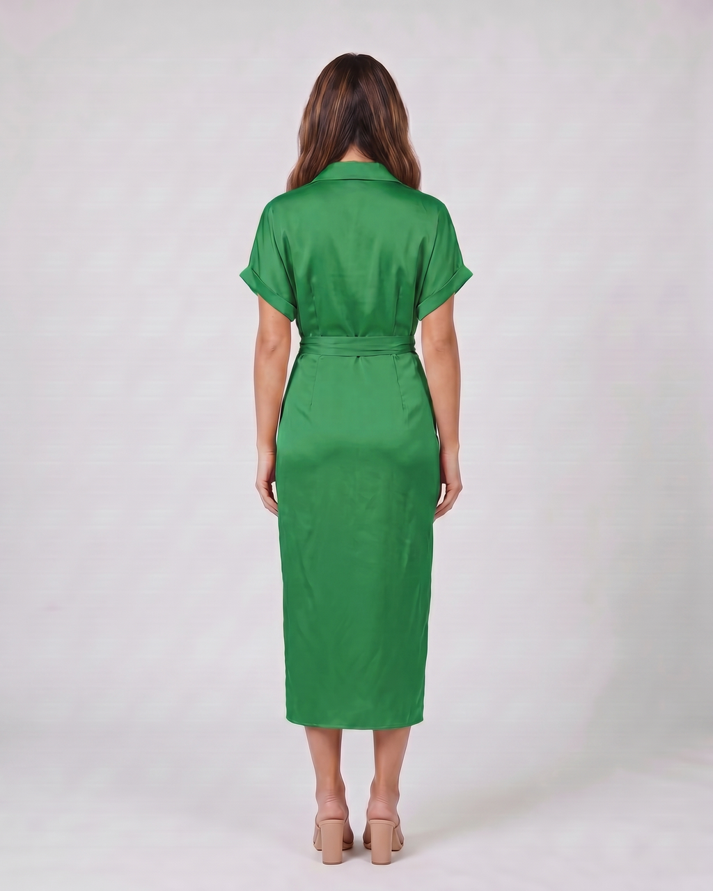Back view of green wedding guest collared v neck midi dress showing solid back