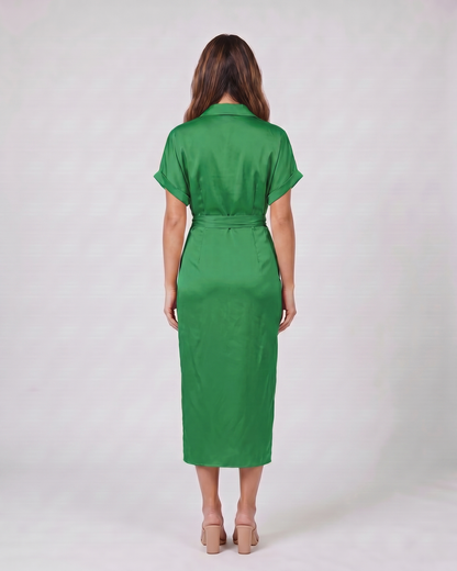 Back view of green wedding guest collared v neck midi dress showing solid back