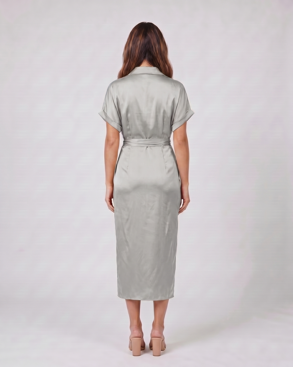 Back view of light gray wedding guest collared v neck midi dress showing solid back