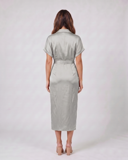 Back view of light gray wedding guest collared v neck midi dress showing solid back