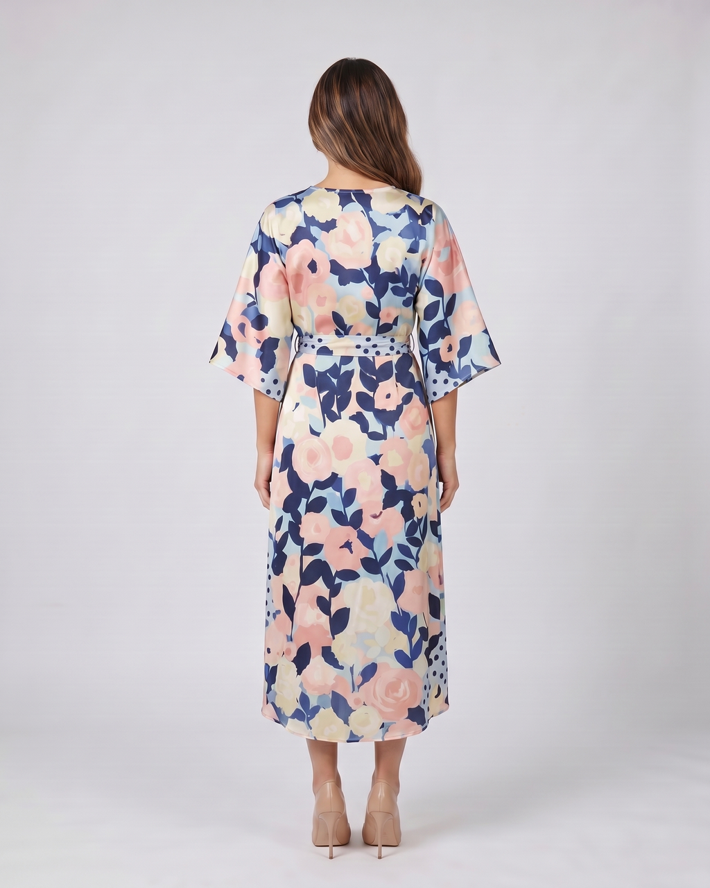 Back view of floral wedding guest floral kimono midi dress showing solid back