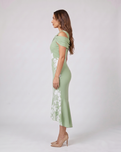Side view of green wedding guest floral off shoulder midi dress