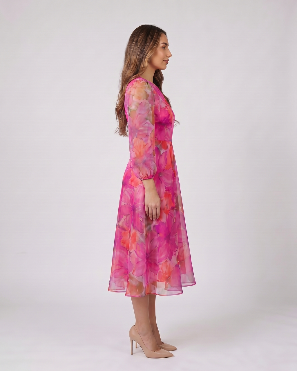 Side view of pink wedding guest floral puff sleeve midi dress