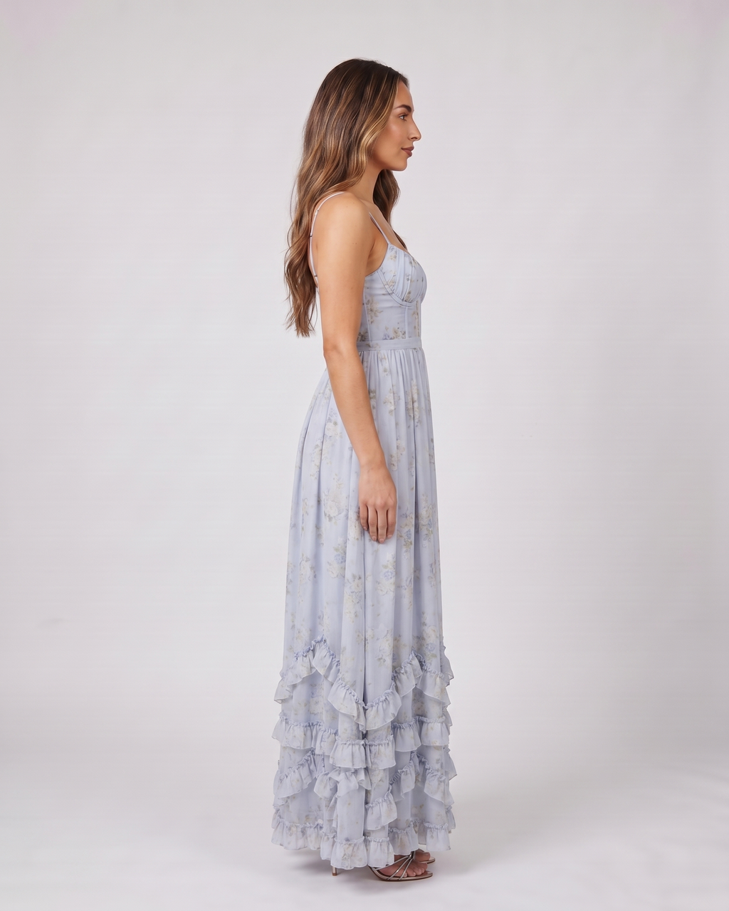 Side view of blue wedding guest floral sweetheart maxi dress