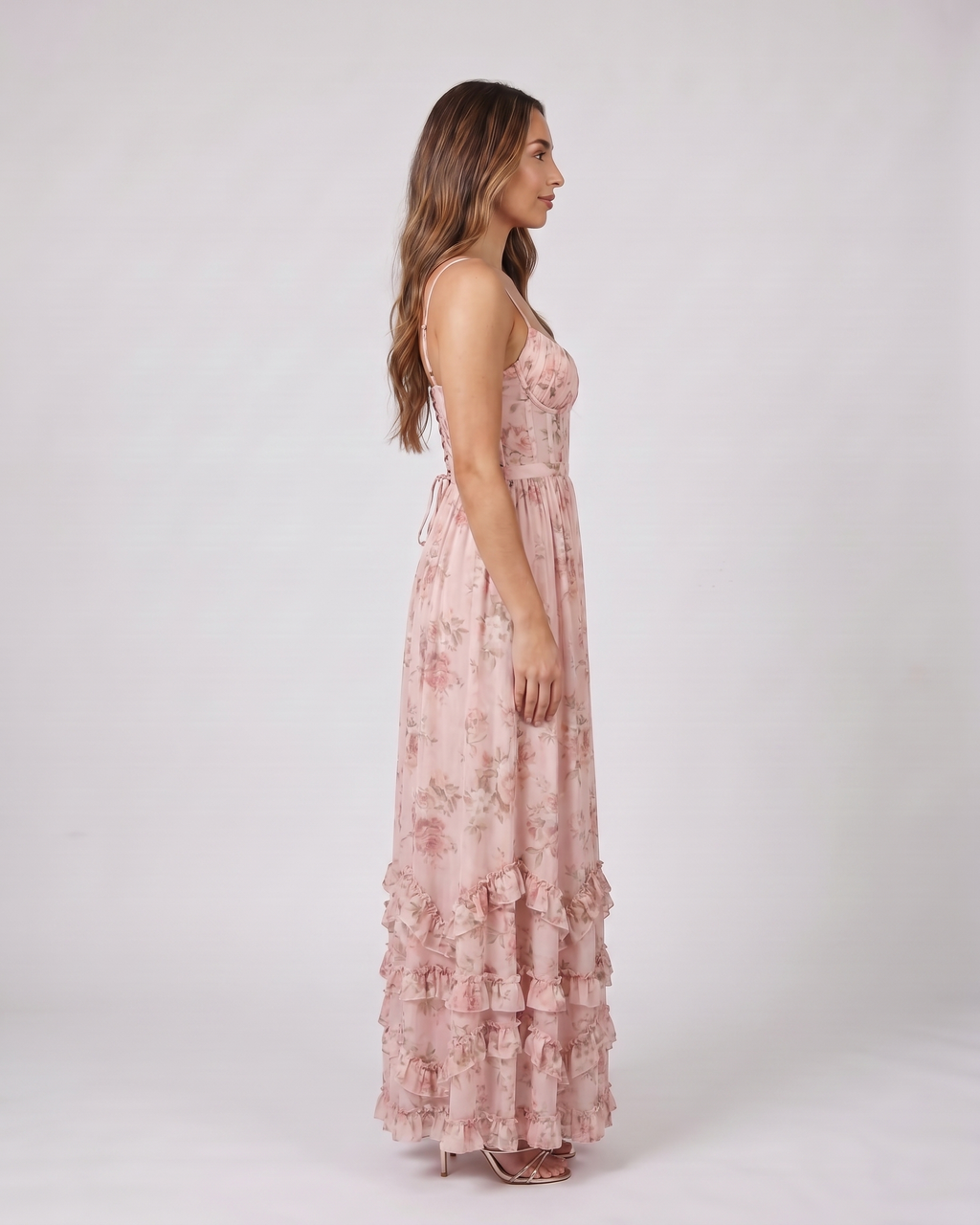 Side view of pink wedding guest floral sweetheart maxi dress