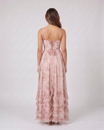 Back view of pink wedding guest floral sweetheart maxi dress showing lace-up corset back